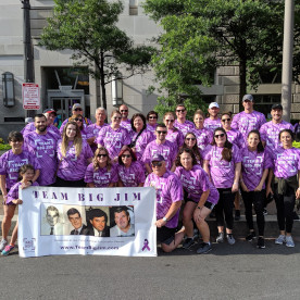 TBJ members carrying banner @ PurpleStride